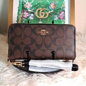 Coach NWTs Long Zip Around Wallet In Signature Canvas